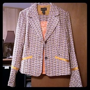 3 piece suit orange and brown.